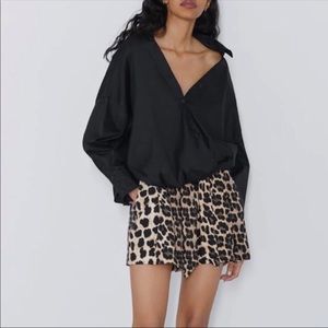 Zara paper bag cheetah shorts.